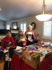 Arcie, Pat &amp; Carol stuffing stockings